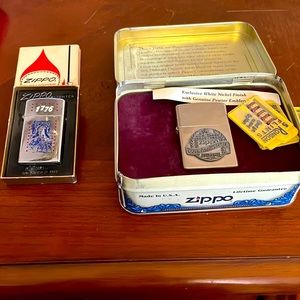 Two vintage lighters the zippo 60th anniversary